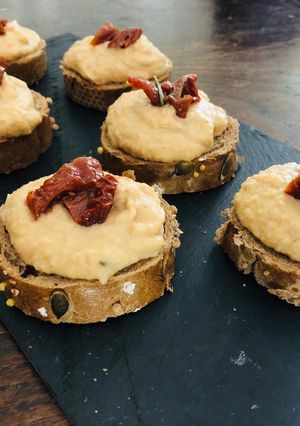 A picture of Whole Wheat Crostini with Hummus.