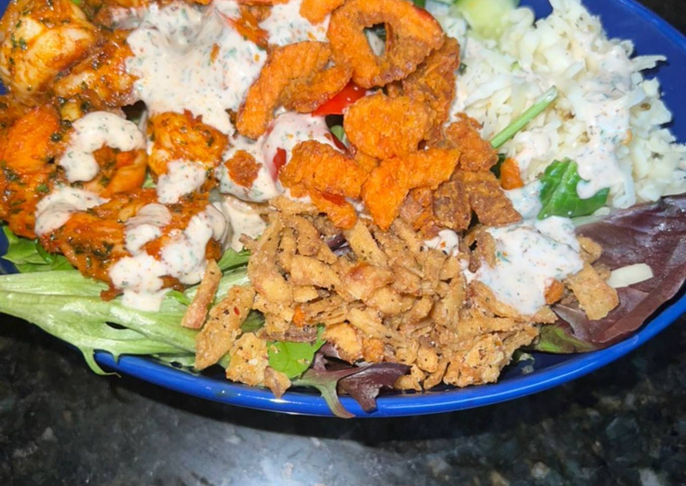 Decorated salad with black shrimp