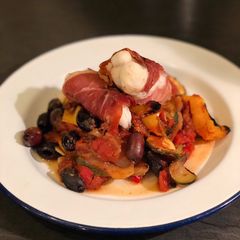 Monkfish in Parma ham with kalamata olive ratatouille A picture of Monkfish in Parma ham with kalamata olive ratatouille.