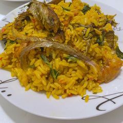 A picture of Palm oil rice.