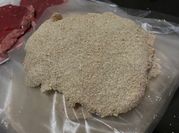 Una foto de milanesa de carne