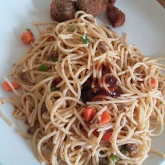 A picture of Vegetable Spaghetti and bbq sauce.