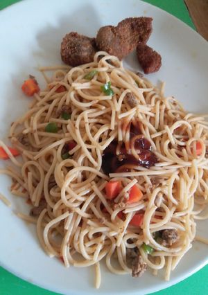 A picture of Vegetable Spaghetti and bbq sauce.