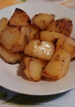 Una foto de Papas sudadas con orégano