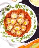 Thịt viên bọc trứng cút sốt cà