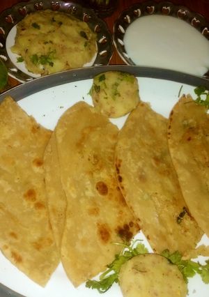 A picture of Aloo prhta with bhurta sweet yogert.