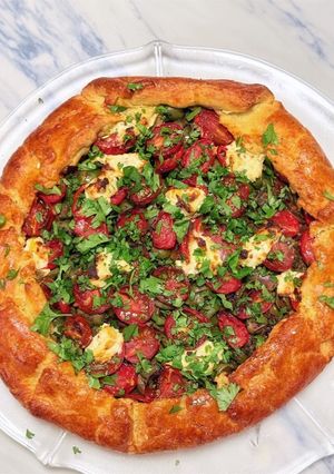 A picture of Puttanesca galette with lemon ricotta.