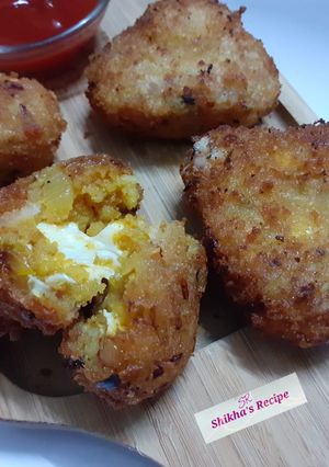 A picture of Potato cheese bombs.