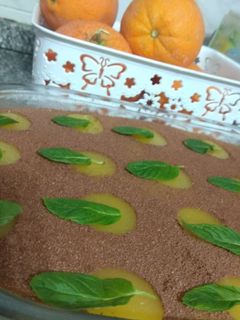 صورة لوصفة كيكه البسكويت والبرتقال