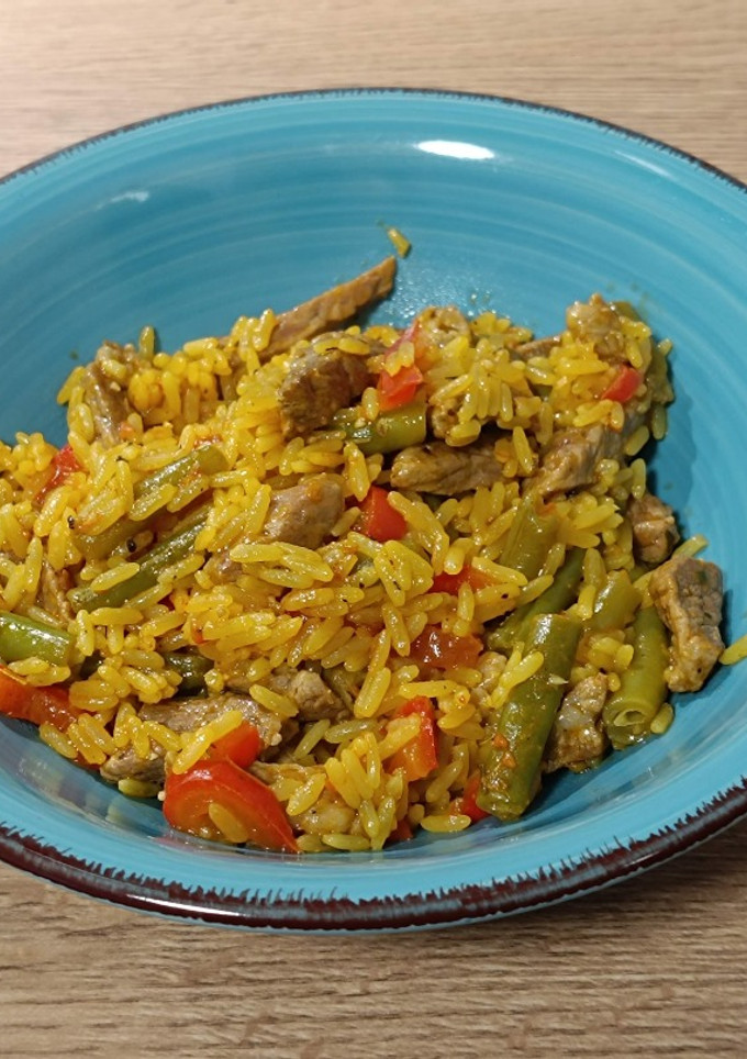 Una foto de Arroz ibérico de bellota