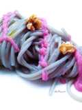 Spaghetti con cavolo viola e noci