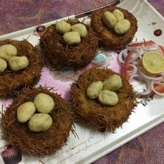 A picture of Bird's nest with veg eggs.