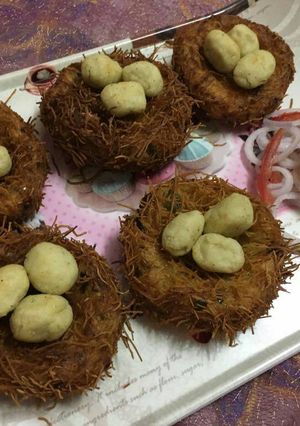 A picture of Bird's nest with veg eggs.