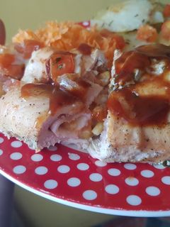 Una foto de Rollo de pechuga y papas con orégano