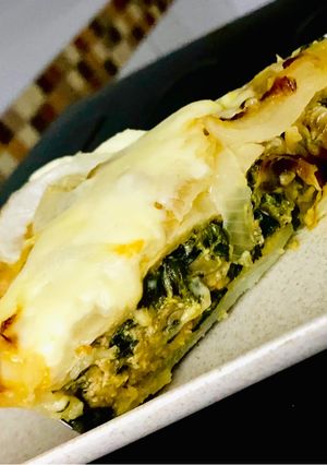Una foto de EMPANADA DE 🥬ESPINACAS🥬 Y 🐟ATÚN🐟 A LA 🍕FUGAZETA🍕