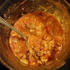 A picture of Farm girl homemade chill with a twice and corn bread crob.