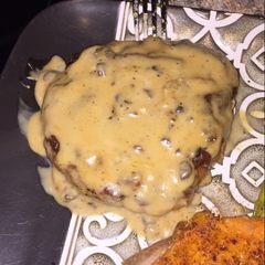A picture of Baked Pork Chops with Creamy Mushroom Sauce.