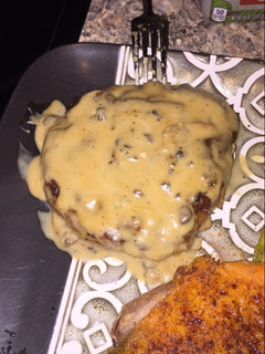 A picture of Baked Pork Chops with Creamy Mushroom Sauce.