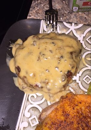 A picture of Baked Pork Chops with Creamy Mushroom Sauce.