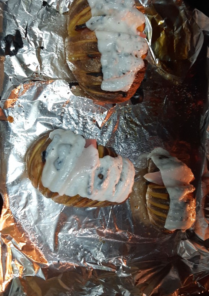 Una foto de Patatas asadas con queso