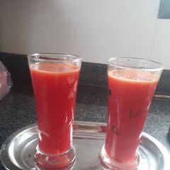 A picture of Pomegranate and oranges juice.
