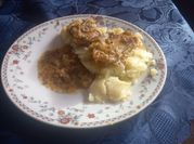 Una foto de pechugas de pollo en salsa