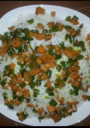 A picture of White Rice and stir- fried veggies.