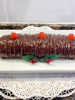 Una foto de Brazo gitano relleno con crema pastelera