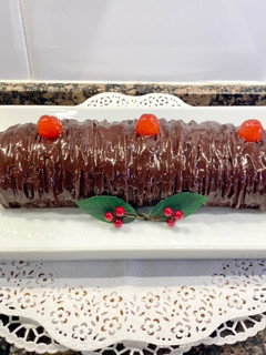 Una foto de Brazo gitano relleno con crema pastelera