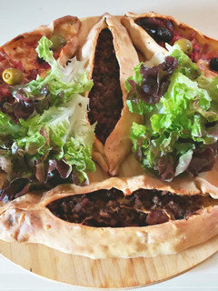 Una foto de Pide (pizza turca)
