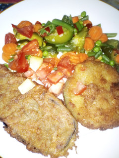 Una foto de Milanesas de berenjena y zapallitos