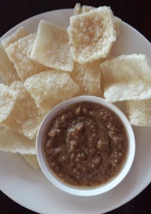 A picture of Crispy Rice with tamarind sauce.