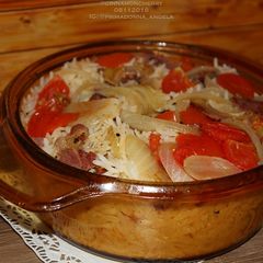 A picture of Tomato and Smoked Beef Rice.