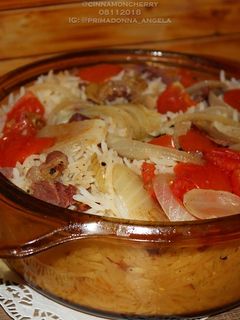 A picture of Tomato and Smoked Beef Rice.