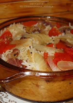 A picture of Tomato and Smoked Beef Rice.