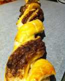 Trenza de hojaldre con nutella y chispas de chocolate