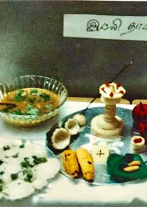 A picture of IDLI POOJA THALI. EVERYTHING IS MADE OUT OF IDLIES.Coconut, banana,apple, etc.