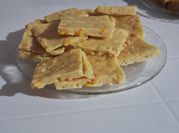 Una foto de fainá queso choclo