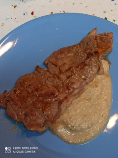 Una foto de Entrecot con salsa de setas