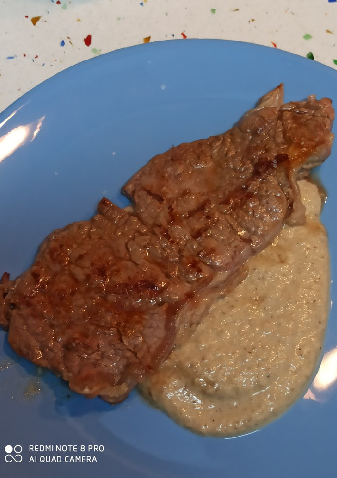 Una foto de Entrecot con salsa de setas