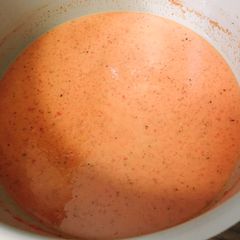 A picture of Tomato Basil Soup / with grilled cheese.