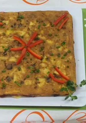 Una foto de Tortilla de papas rellena