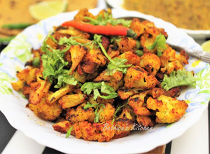 A picture of Spicy Aloo Gobhi Matar Stir Fry (Potato Cauliflower Green Peas Curry).