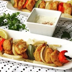 A picture of Skewered chicken kababs.