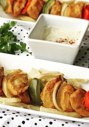A picture of Skewered chicken kababs.