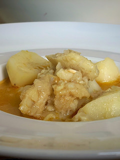 Una foto de Papas con bacalao