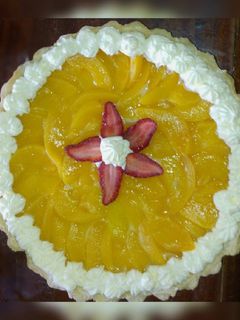 Una foto de Tarta de durazno con crema pastelera