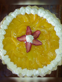 Una foto de Tarta de durazno con crema pastelera