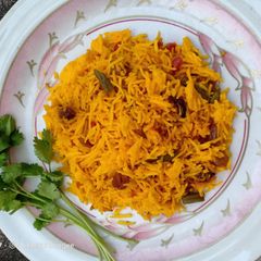 A picture of Basanti Pulao - Savor the Sunshine with the Golden grains.