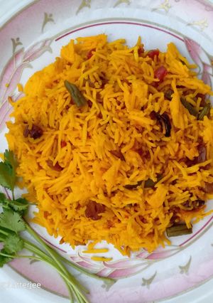 A picture of Basanti Pulao - Savor the Sunshine with the Golden grains.